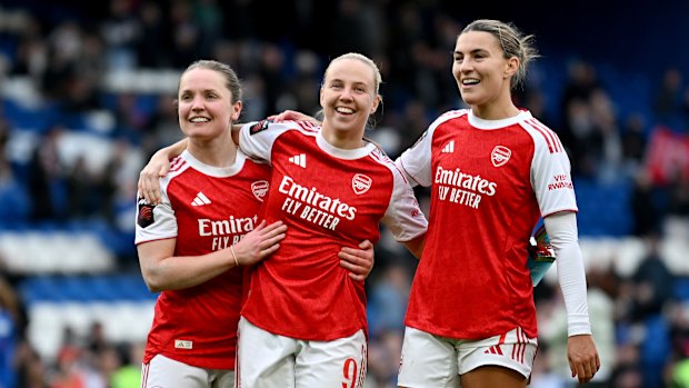 Beth Mead, Kim Little and Steph Catley celebrate Arsenal’s win.