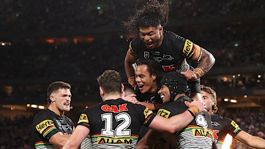 The Panthers celebrate Charlie Staines’ second-half try.
