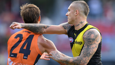 Dustin Martin reacts poorly to the attention of De Boer.