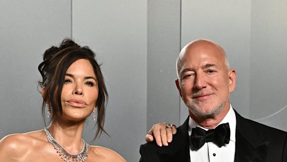 Lauren Sanchez Bezos and Jeff Bezos appear at the Vanity Fair Oscar Party in March.