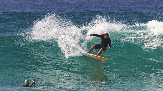 Luke Kennedy has a surf at Bondi.