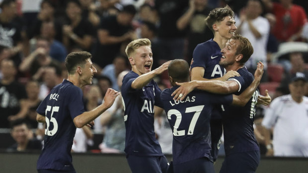 Tottenham's Harry Kane (right) celebrates with teammates after scoring the winning goal against Juventus in Singapore.