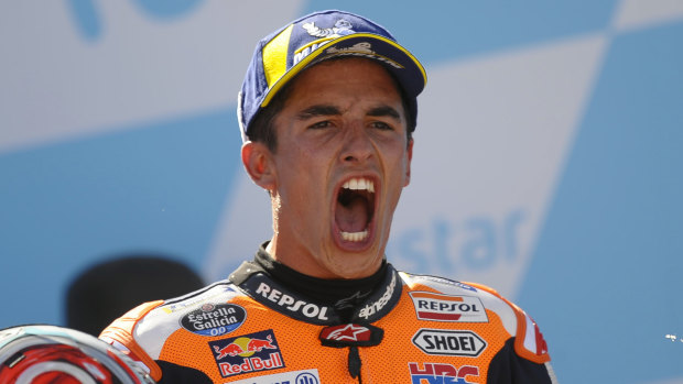 Victory roar: Honda rider Marc Marquez celebrates after winning the Aragon MotoGP.