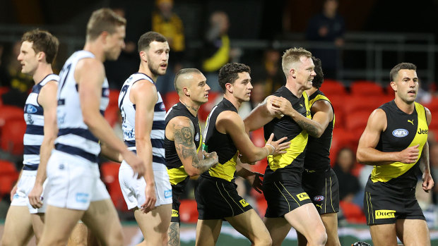 The Tigers celebrate Riewoldt's opening goal in round 17.