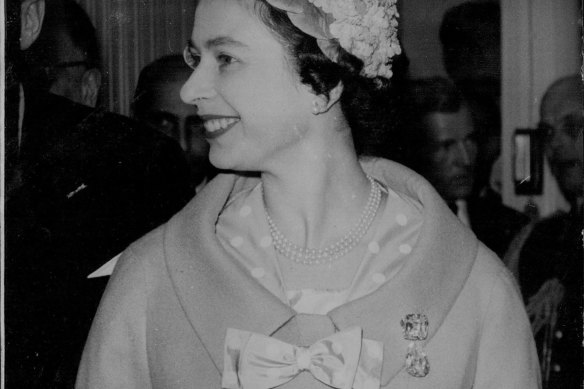 Queen Elizabeth II wears the famed Cullinan Diamonds on her coat lapel as she visits the Asscher Diamond Company’s works in Amsterdam on March 25, 1958.