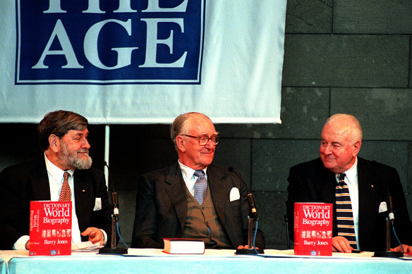 Barry Jones (left) launches the third edition of his <i>Dictionary of World Biography</i> in 1998, with a little help from Malcolm Fraser and Gough Whitlam.