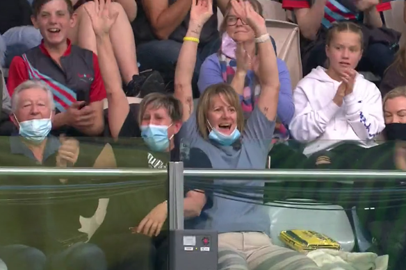 Sharon McKeown reacts to Kaylee’s world record in the stands in Adelaide. 