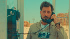 Augie Steenbeck (Jason Schwartzman) is forced to call his father-in-law Stanley Zak (Tom Hanks).