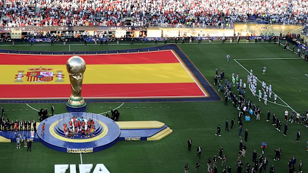 Argentina are pictured looking away from Spain’s trophy presentation