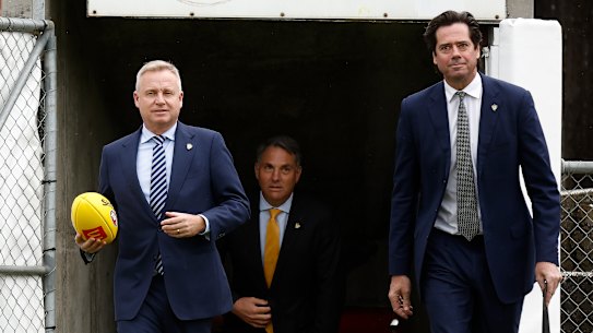 From left: Tasmanian Premier Jeremy Rockliff, acting Prime Minister Richard Marles and AFL CEO Gillon McLachlan arrive for the announcement of Tasmania’s AFL licence.