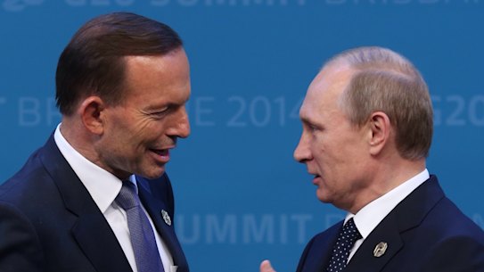 AS prime minister, Tony Abbott welcomes the Russian President Vladimir Putin to the G20 in Brisbane in 2014.