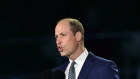 Prince William speaks during the concert at Windsor Castle in Windsor.