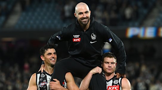 MELBOURNE, AUSTRALIA - MAY 28: Steele Sidebottom of the Magpies is chaired off in game 300 during the round 11 AFL match between Collingwood Magpies and North Melbourne Kangaroos at Marvel Stadium, on May 28, 2023, in Melbourne, Australia. (Photo by Quinn Rooney/Getty Images)
