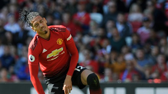 Chasm: Manchester United defender Chris Smalling reacts during their home loss to relegated Cardiff City.