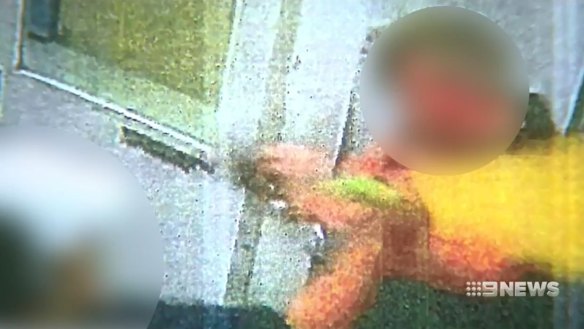 A detainee confronts a prison officer with a cricket bat at Malmsbury Youth Detention Centre. 