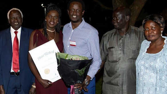 Yuot Alaak with his parents and siblings at the 2018 Hungerford Awards, for which the manuscript of his memoir was shortlisted. 