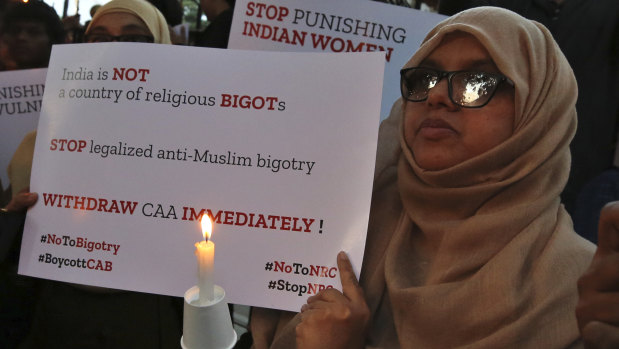 An Indian Muslim woman in Bangalore participates in a protest against the new citizenship law that opponents say threatens India's secular identity.