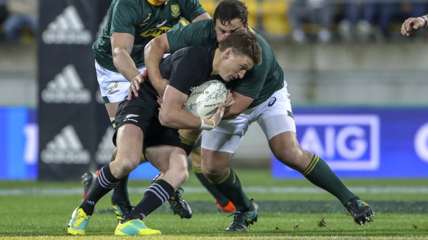 Wrapped up: All Blacks No.10 Beauden Barrett was shackled effectively by the Springboks.