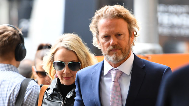 Australian actor Craig McLachlan and his partner Vanessa Scammell arrive at the Melbourne Magistrates Court on Thursday.