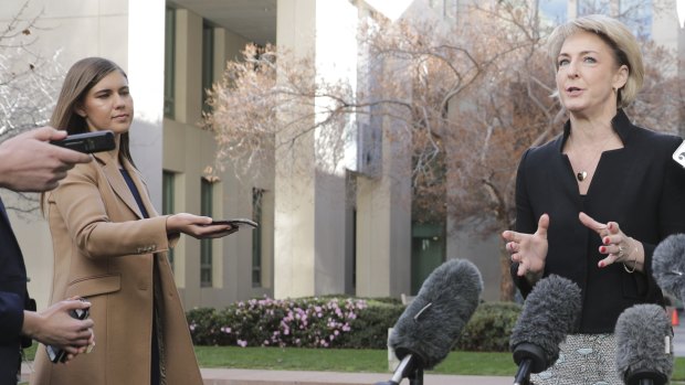 Liberal Party staff member Brittany Higgins (left) seen at a media event with senator Michaelia Cash in June, 2019.