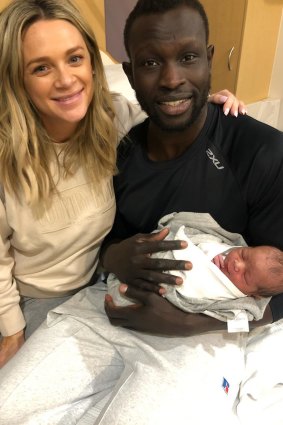 Majak Daw and his partner Emily have welcomed their first child