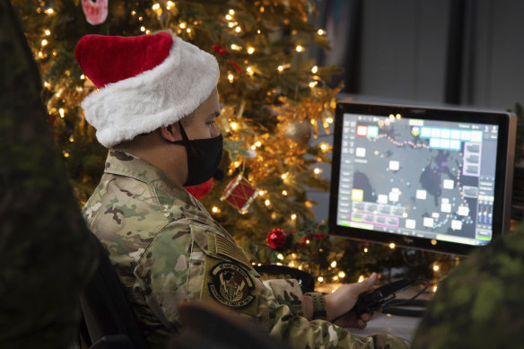Defence personnel track Santa’s journey.