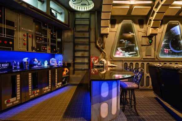 The attention to detail in this Millennium Falcon-styled media room is profound.