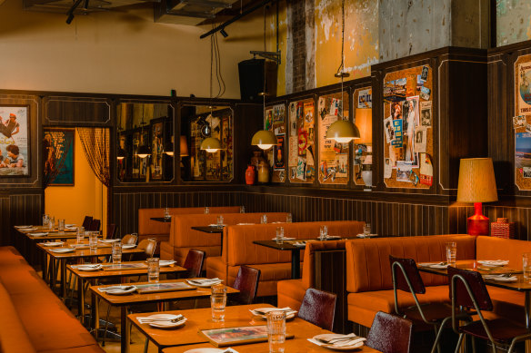 The bright orange dining room of Jimmy’s Falafel in Sydney.