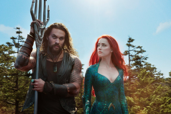 Jason Momoa as Aquaman and Amber Heard as Mera.