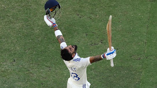 Virat Kohli celebrates his ton.