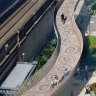 The concept artwork depicting interconnected eels runs the full length of the 200-metre cycleway.