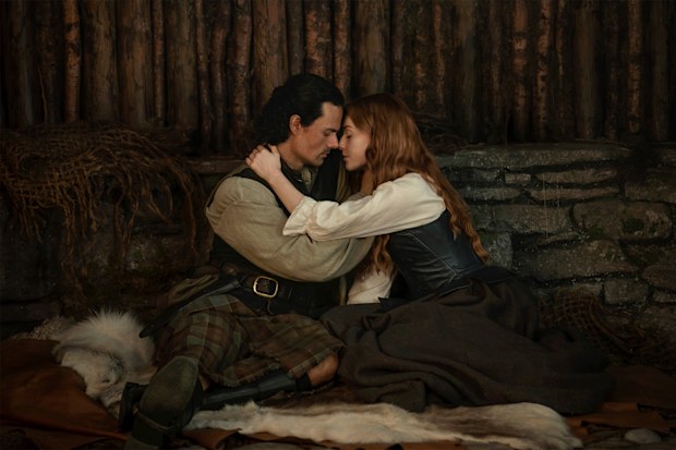 Outlander: Blood Of My Blood season 2 promotional image. Jamie Roy as Brian Fraser. Harriet Slater as Ellen MacKenzie.