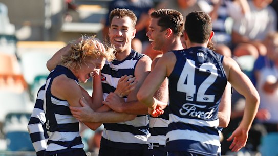 Ollie Dempsey celebrates a goal on debut.