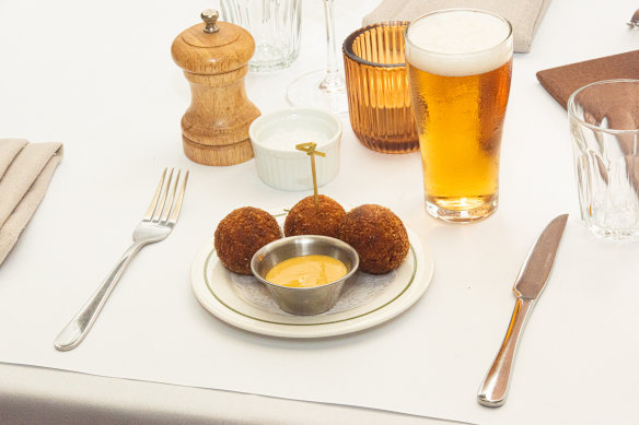 Bitterballen are bite-sized croquettes filled with curry-spiced chicken.