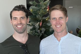 James Bolster (right) and his partner, Zann, lived in a two-bedroom apartment with their COVID-positive flatmate but avoided infection. 