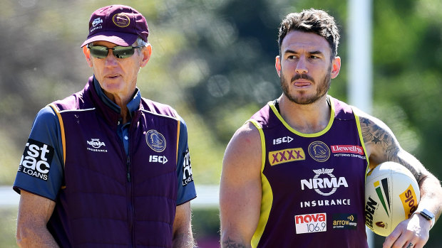 United: Wayne Bennett with Darius Boyd, reportedly one of the players who visited the coach's house instead of attending a barbecue organised by chief executive Paul White.