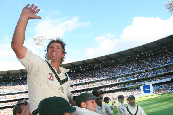 Teammates carry Shane Warne off the ground after his final game at MCG in 2006.