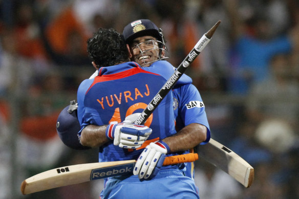 MS Dhoni (right) celebrates winning the 2011 World Cup with Yuvraj Singh.