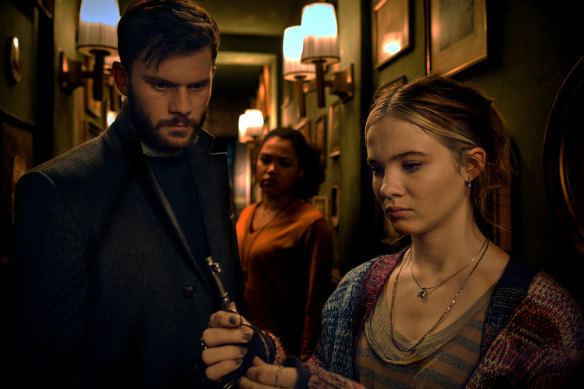 Jeremy Irvine, Ruby Barker and Freya Allan in a scene from Baghead.