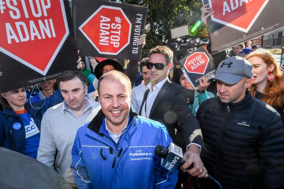 Anti-Adani campaigners surround Federal Treasurer Josh Frydenberg’s Kooyong in Kooyong electorate in Melbourne, protesting the Carmichael coal mine.