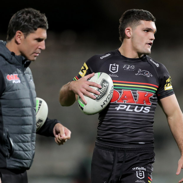 Panthers assistant Trent Barrett with halfback Nathan Cleary before last week's game against South Sydney.