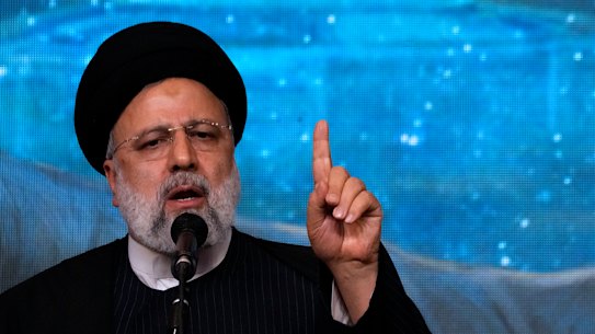 Iranian President Ebrahim Raisi speaks during a commemoration for the Revolutionary Guard General Qassem Soleimani killed in 2020 by a US drone strike.