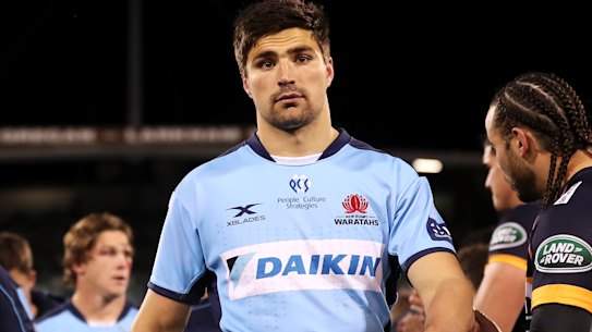 The Waratahs trudge from GIO Stadium after their 27-point loss to the Brumbies. 