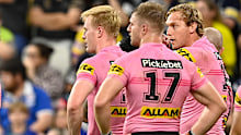 Penrith Panthers players react after leaking a try.