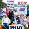 Protests against “reckless renewables” outside Parliament House in Canberra.