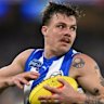 Two late goals from Cameron Zurhaar helped secure North Melbourne’s 10-point win over the Eagles; Jack Williams (far right) kicked West Coast’s first goal, finishing the match with two majors. 