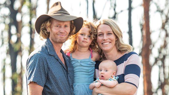 Danny Gosper and Rachael Thornton with their four-year-old daughter Mima and new addition Smokey Thomas Gosper. Smokey was named after the Gospers Mountain fire that burnt through the Colo region where the family lives