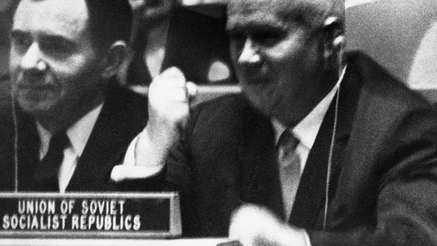 In 1960 Soviet Premier Nikita Khrushchev shows his fury as he pounds his desk at the United Nations during a General Assembly debate on colonialism.