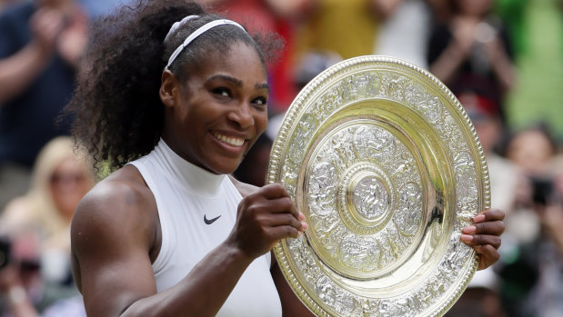 Serena Williams with her seventh Wimbledon trophy.
