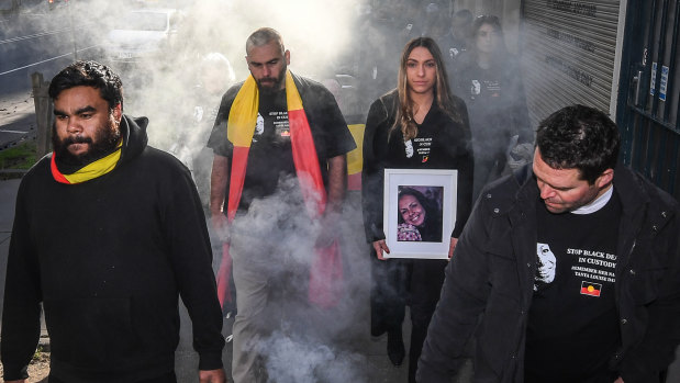 Tanya Day’s family and supporters take part in a smoking ceremony before the 2019 coronial inquest into her death.